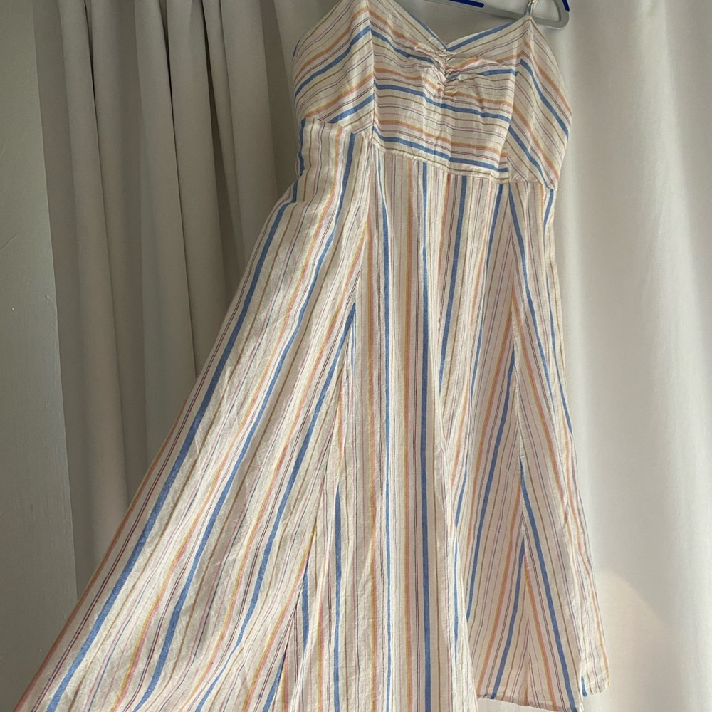 dress white with blue, pink,brown,yellow stripes